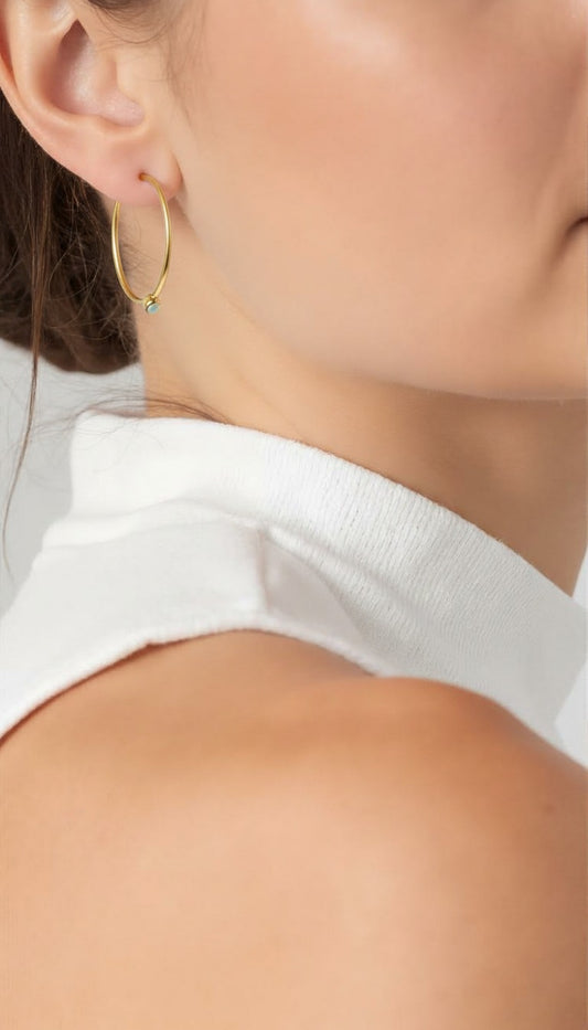 Designs merging organic freshwater pearls with intricate, gold-toned metalwork.