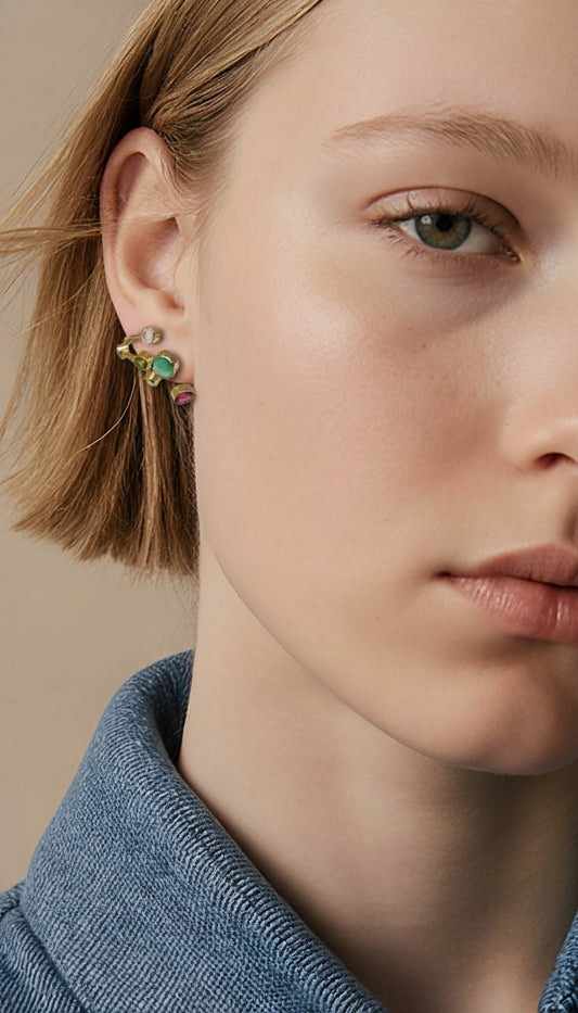 Eclectic, tiered designs that pair smooth gemstone cabochons with unrefined stone beauty.