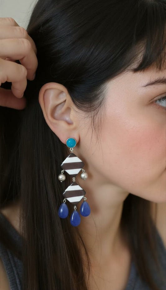 Striped Diamond Tiered Drop Earrings with Blue Teardrop Charms.