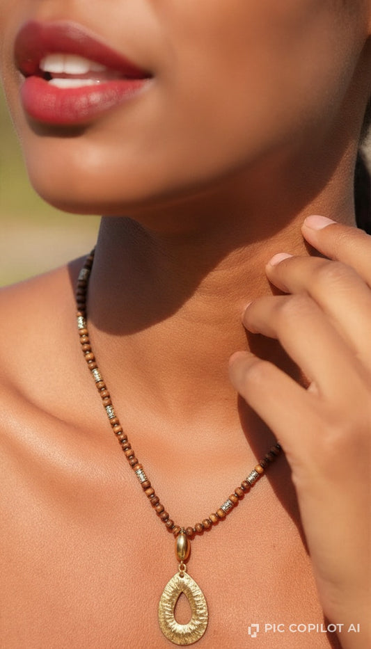 Handcrafted Wooden Bead Necklace with Textured Gold Teardrop Pendant
